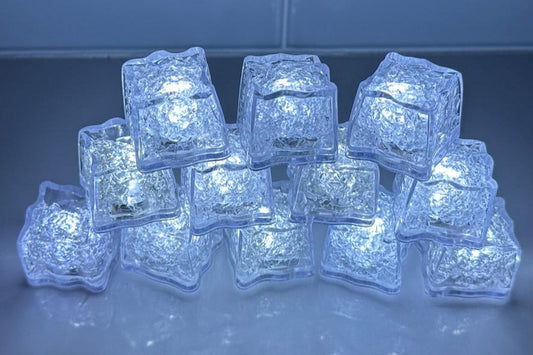 White LED Light up ice cubes with Push Button on/off.   Push Button cubes last longer and work in ice, unlike cubes with moisture sensors (which only work when submerged in liquid).  When on, the bright color operates in 3 modes: slow flash, fast flash, and steady on.  When off, cubes are clear.  FDA approved clear acrylic shell is sealed with freezable gel inside and is submersible safe in beverages.  They are fun LED party lights 