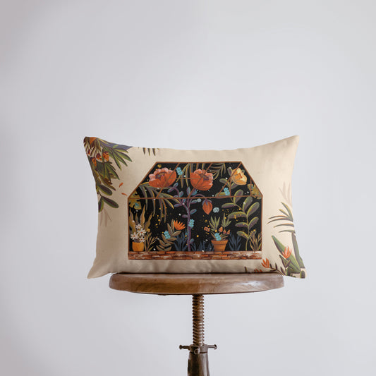 a pillow with a picture of a house on it