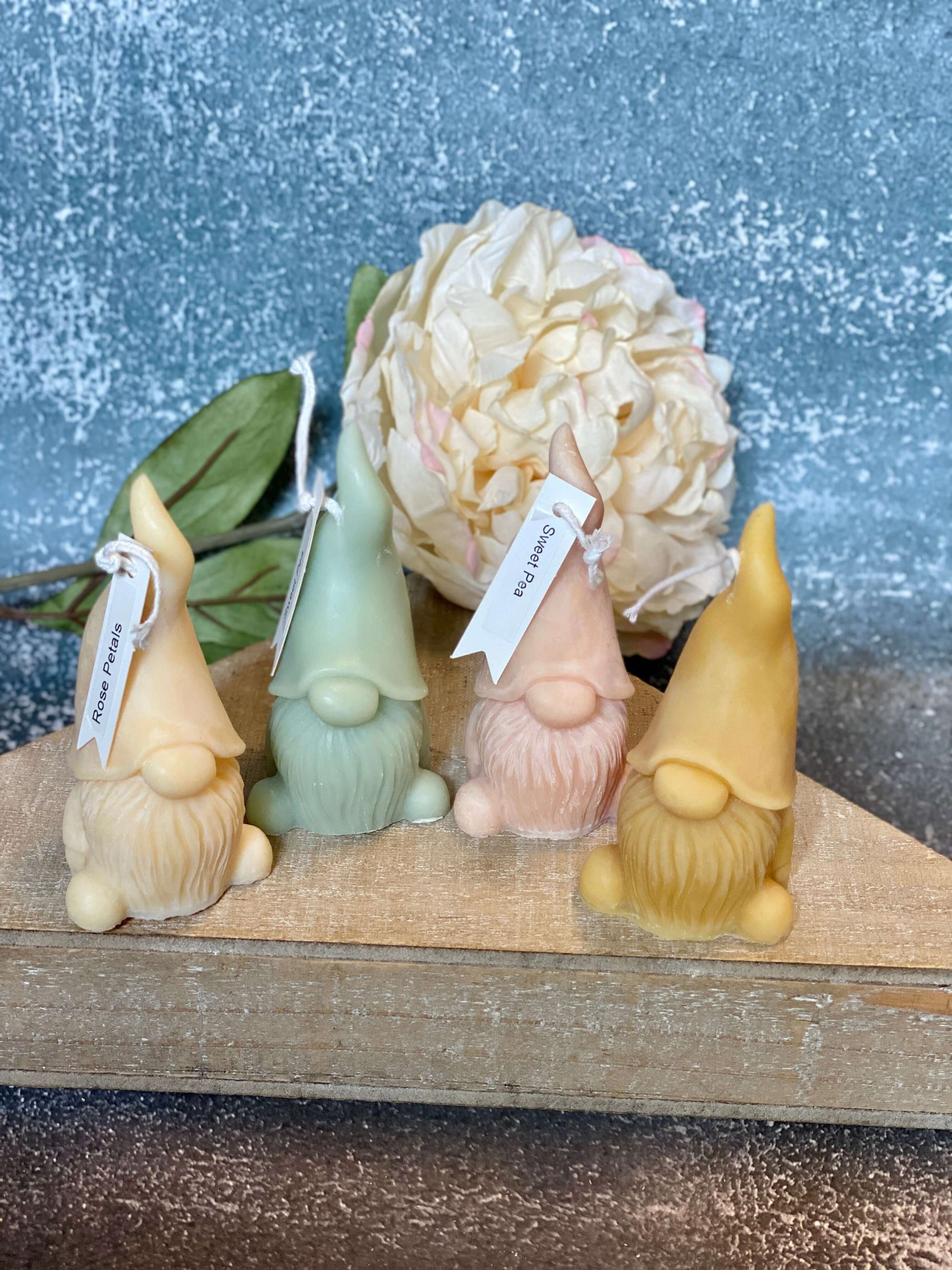 Scented candle with gnome sculpture